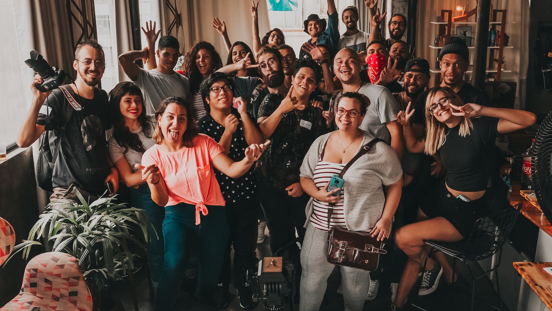 positive diverse people making faces at camera